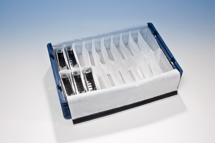 Metallteile verpackt in FleeceGuard Gefache